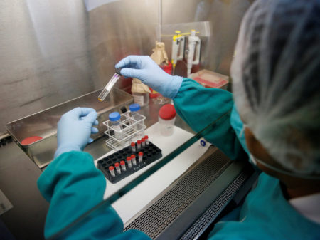 A health technician analyses blood samples for tuberculosis testing in a high-tech tuberculosis lab in Carabayllo in Lima, Peru May 19, 2016